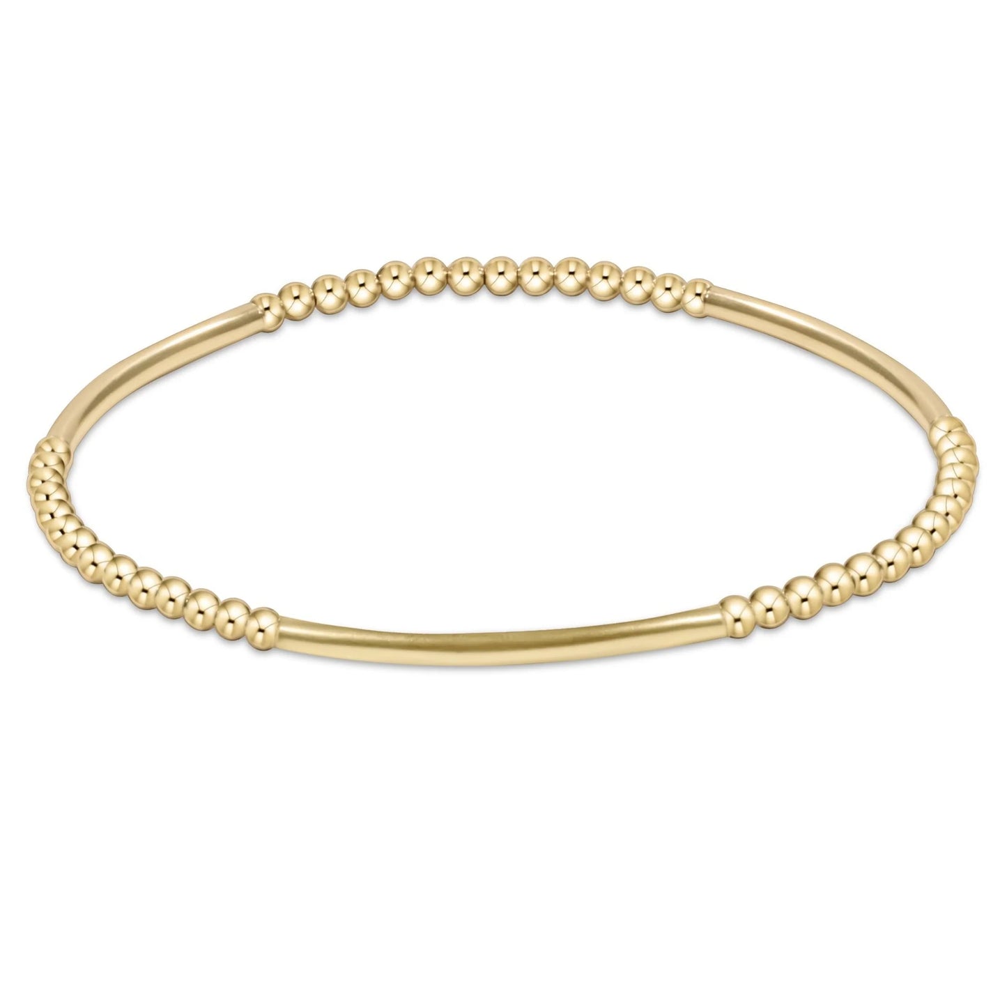 Gold beaded bracelet on a white background