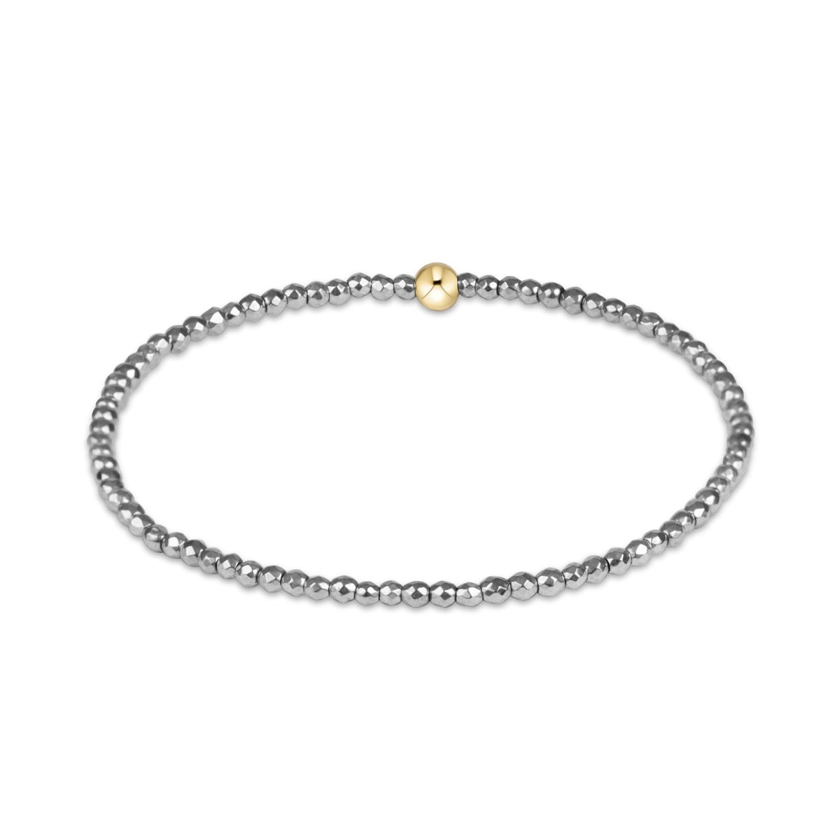A silver beaded stretch bracelet with a single round gold accent bead at the center