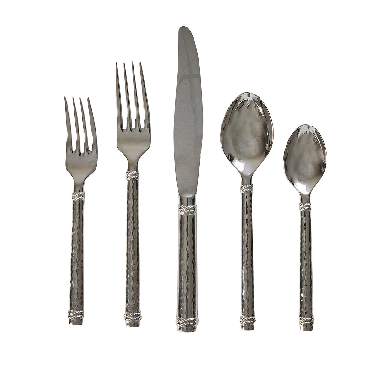 Set of silver cutlery with hammered textured handles on a white background