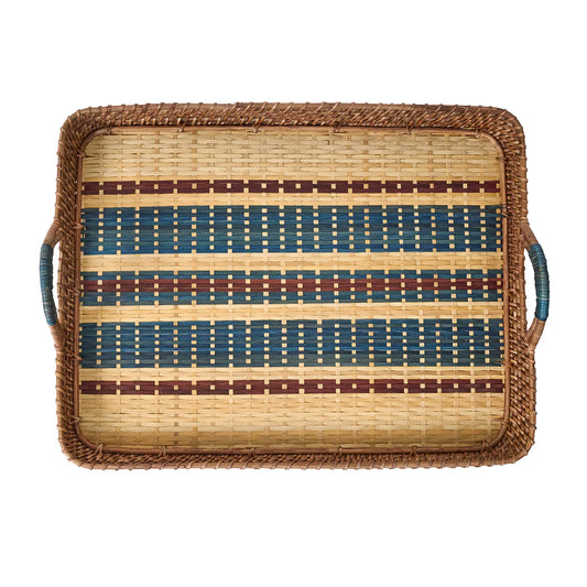 Light, woven tray with decorative dark brown and navy woven pattern on a white background
