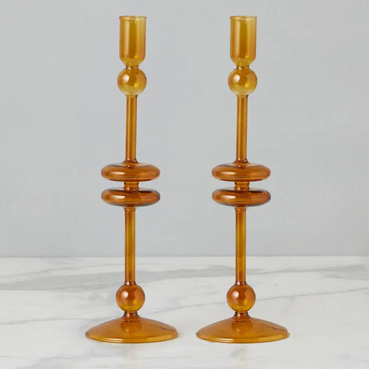 Glass Pair of Amber Candlesticks