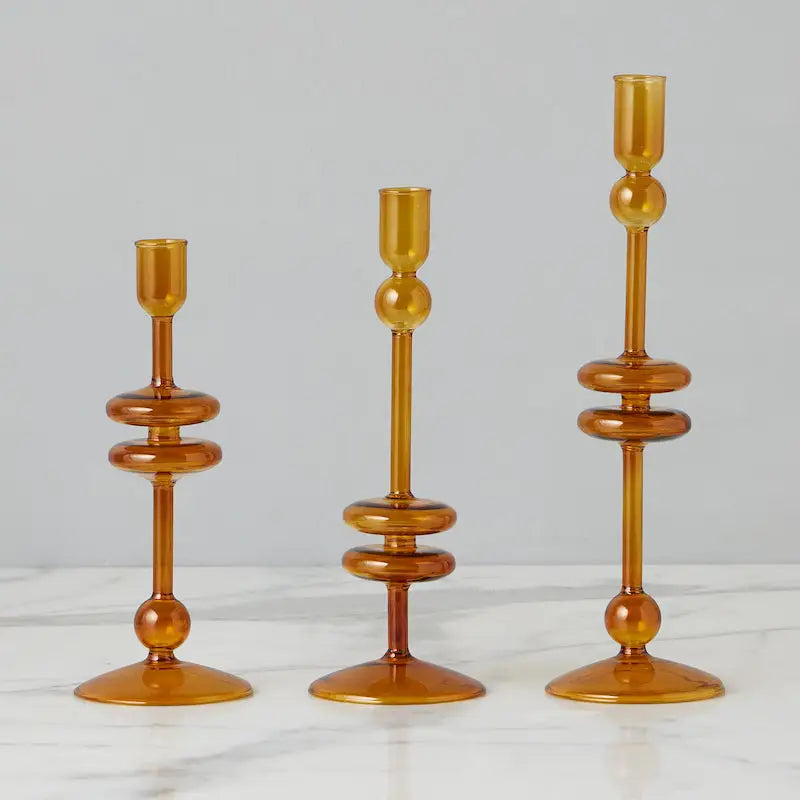 Glass Pair of Amber Candlesticks