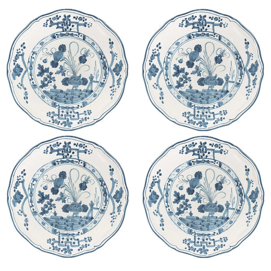 Set of four melamine cocktail plates featuring a chambray blue pattern that imitates fine china.