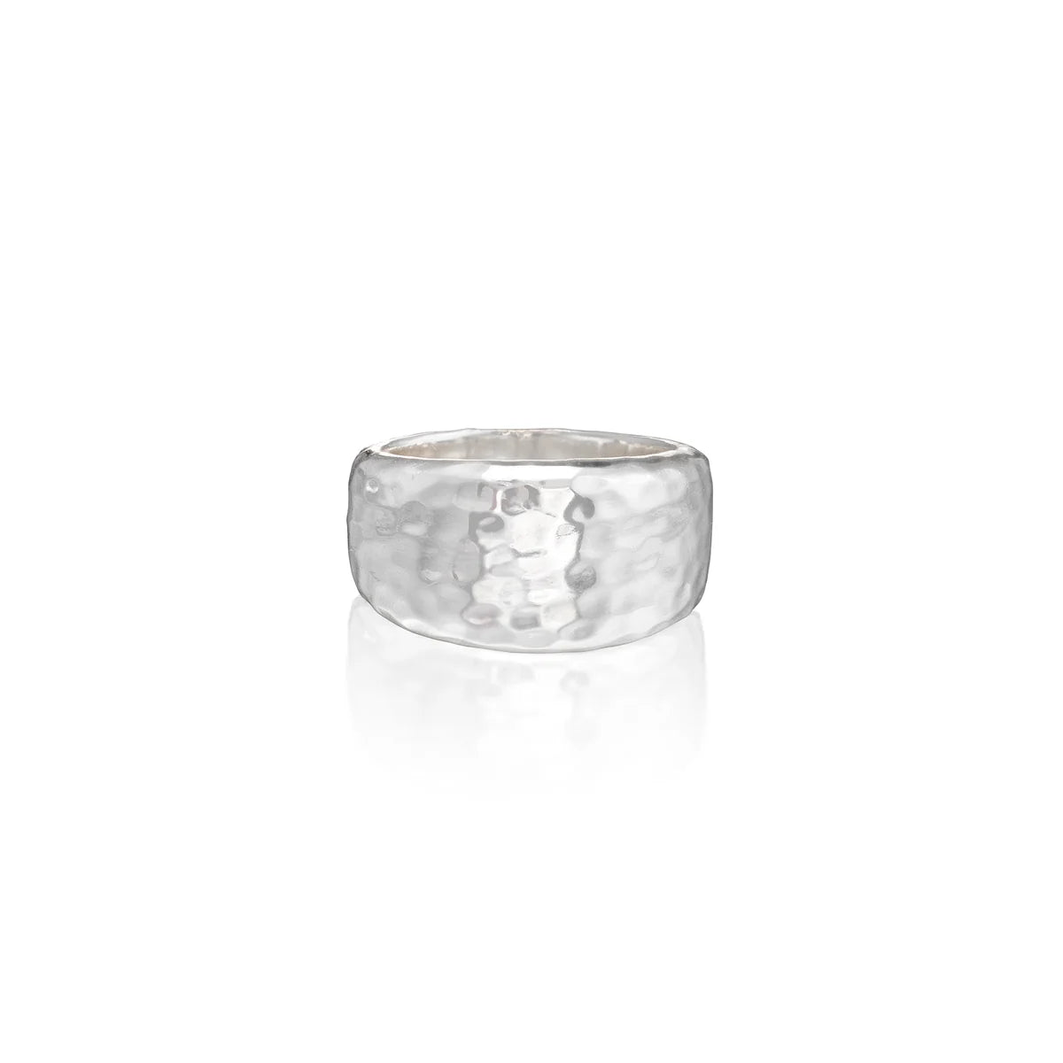 A hammered silver band ring with a textured, dimpled surface, shown on a clean white background with a soft reflection below.