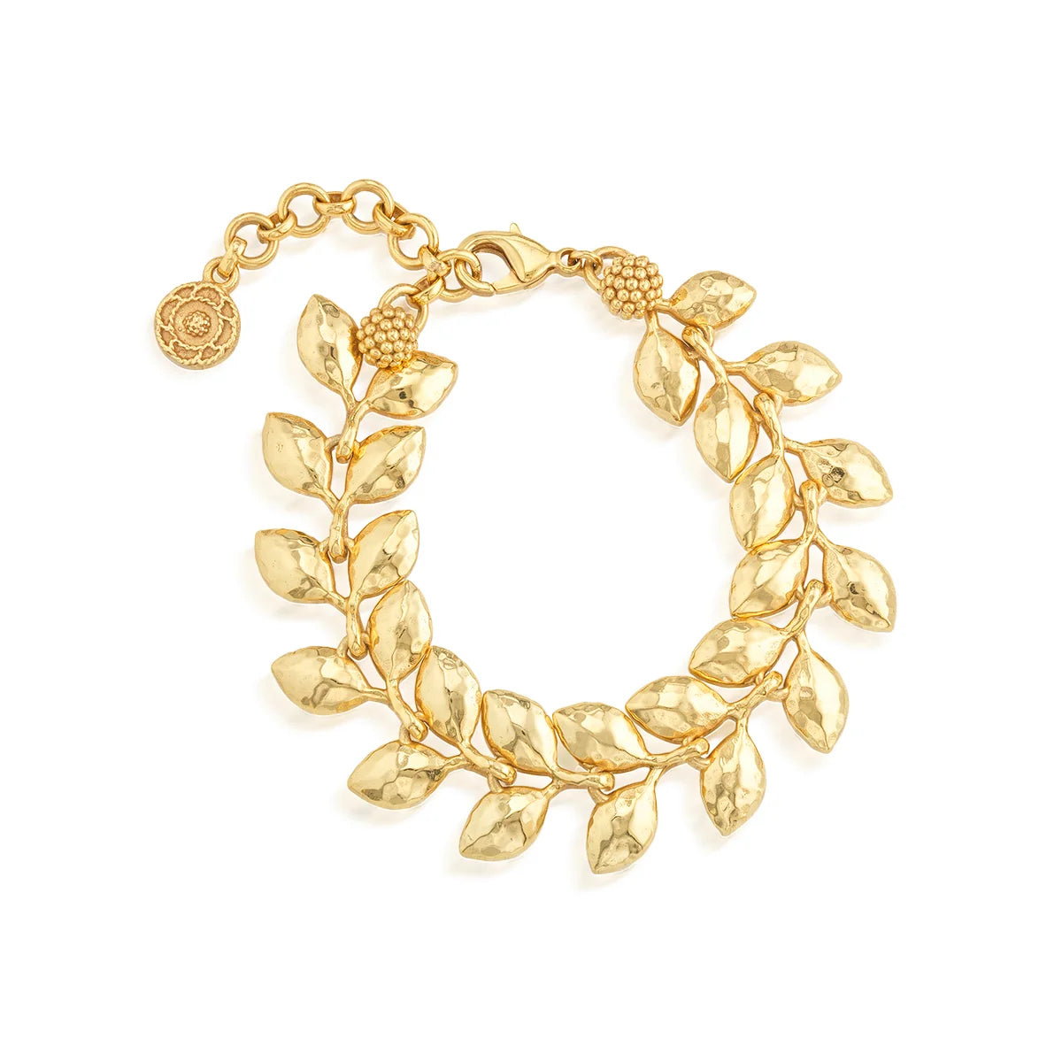 Gold bracelet with leaf-like design on a white background