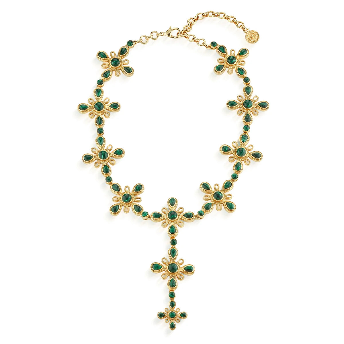 Gold necklace with green gemstones on a white background