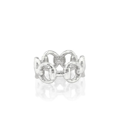 A silver ring with a textured, interlocking horsebit link design, shown on a clean white background with a soft reflection below.