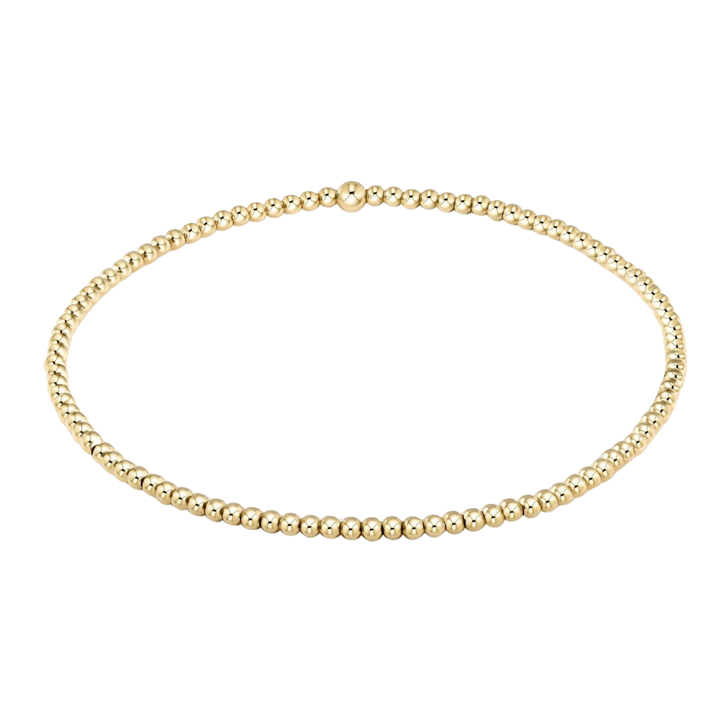 Gold beaded necklace on a white background