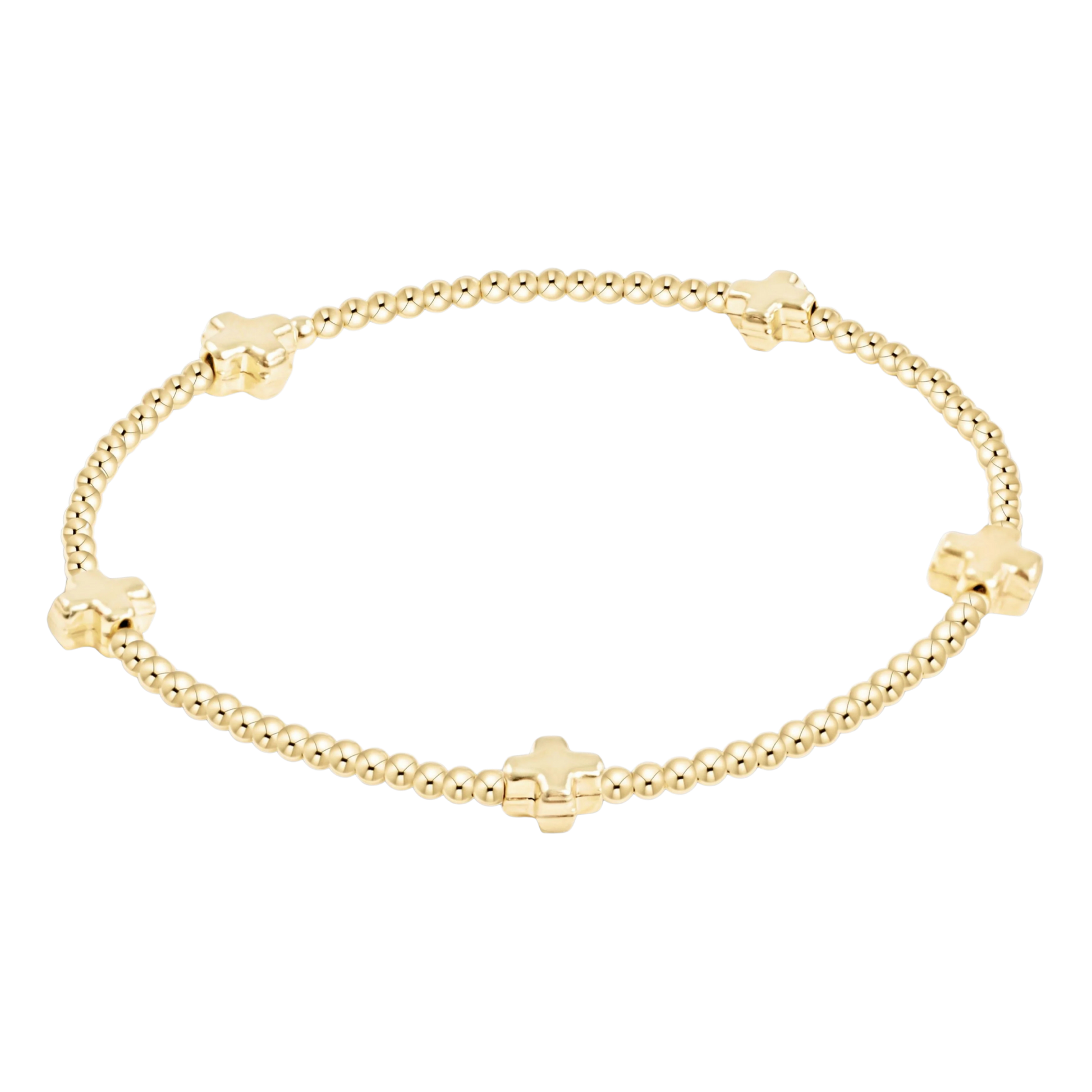 Gold bracelet with cross-shaped beads on a white background