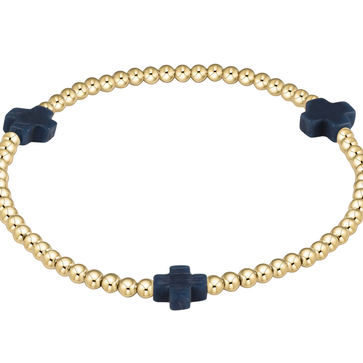 Gold beaded bracelet with navy blue cross-shaped beads on a white background