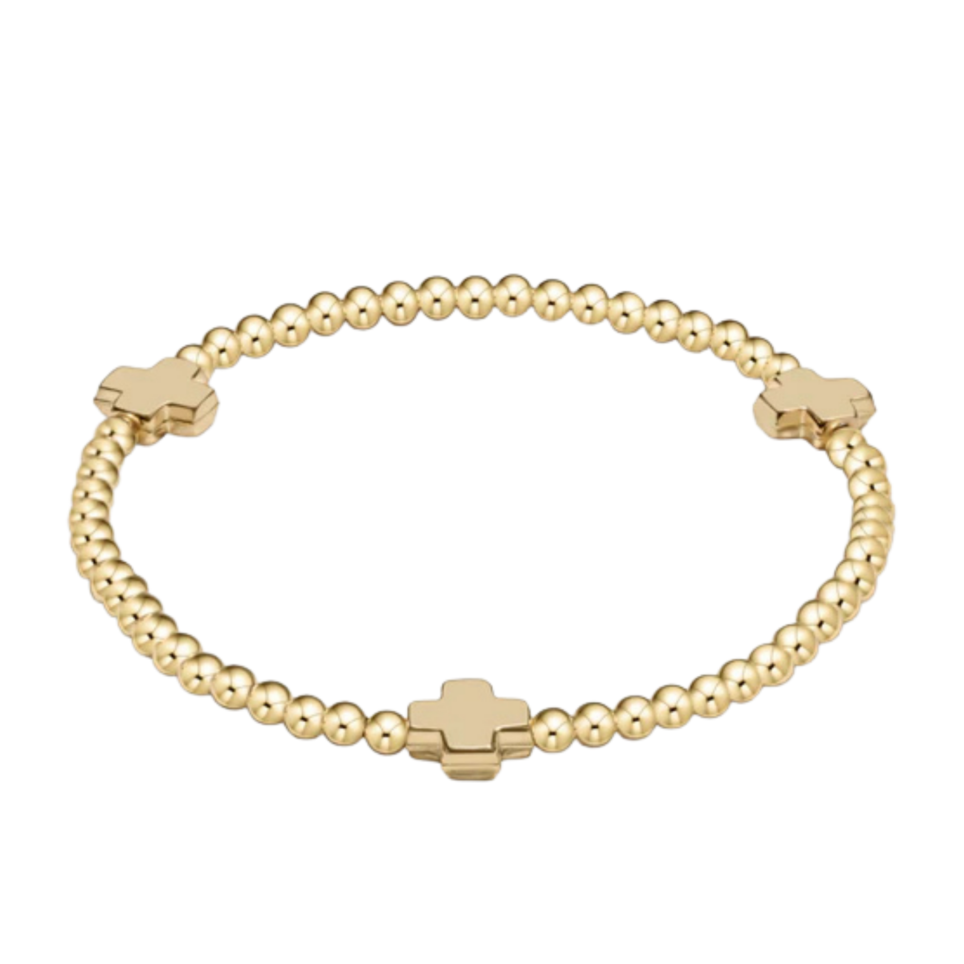 Gold beaded bracelet with cross-shaped beads on a white background