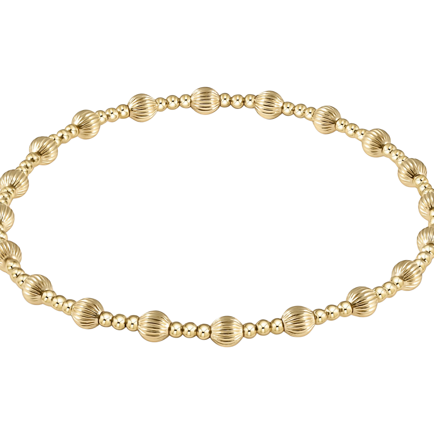 Gold beaded bracelet with textured accents on a white background