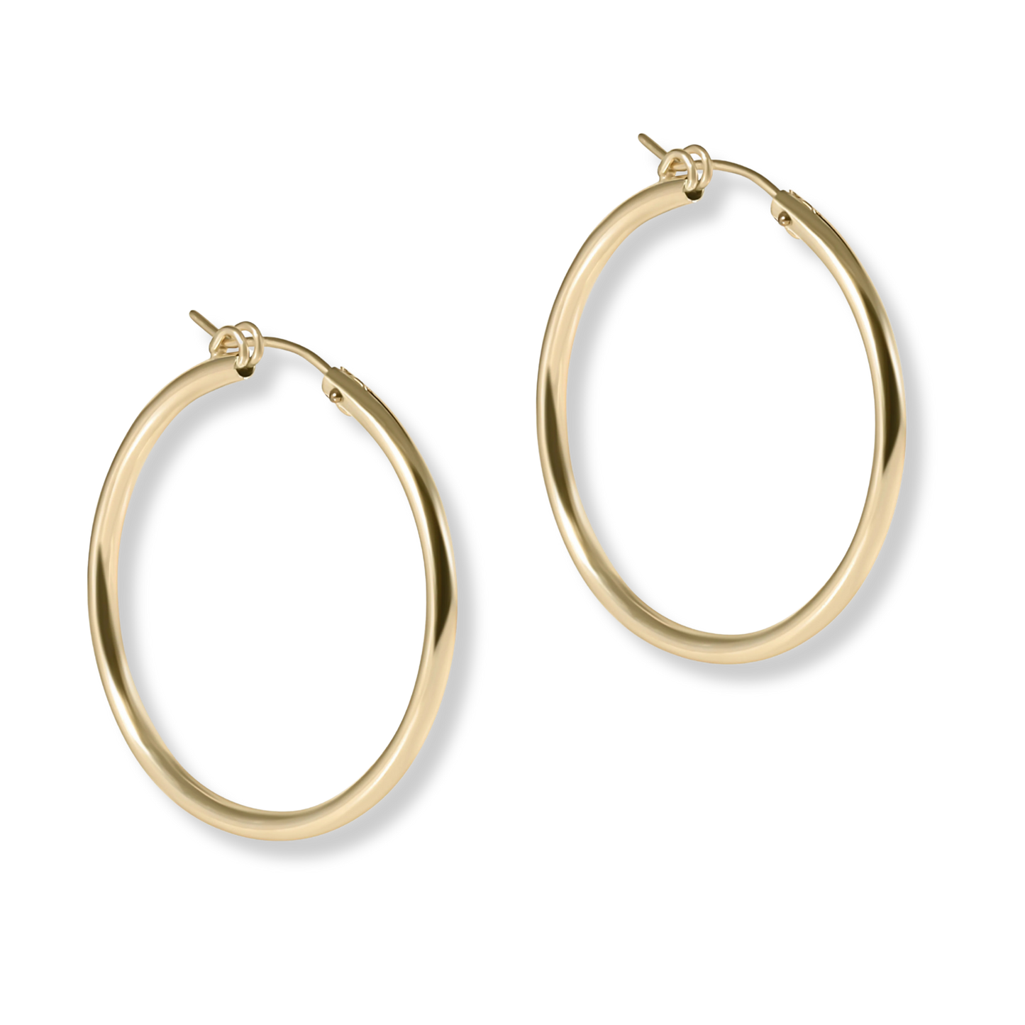 Gold hoop earrings on a white background