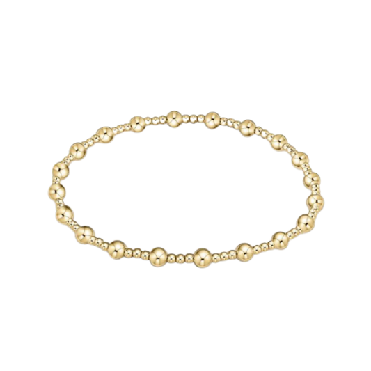 Gold bracelet on a white background