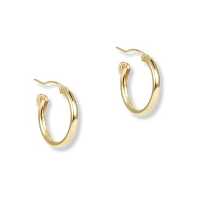 Gold hoop earrings on a white background