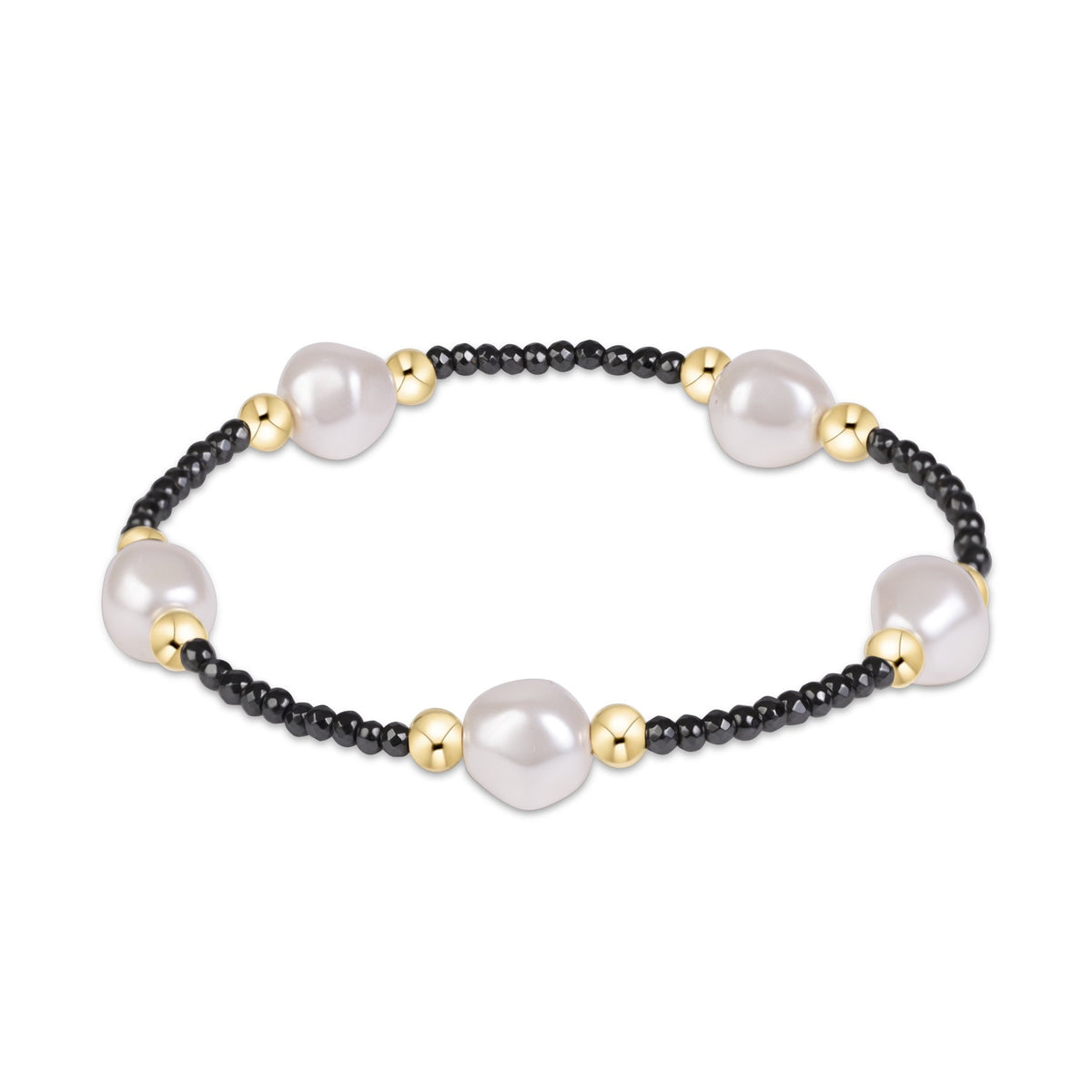 A beaded stretch bracelet featuring large white freshwater pearls, small black seed beads, and polished gold spacer beads.