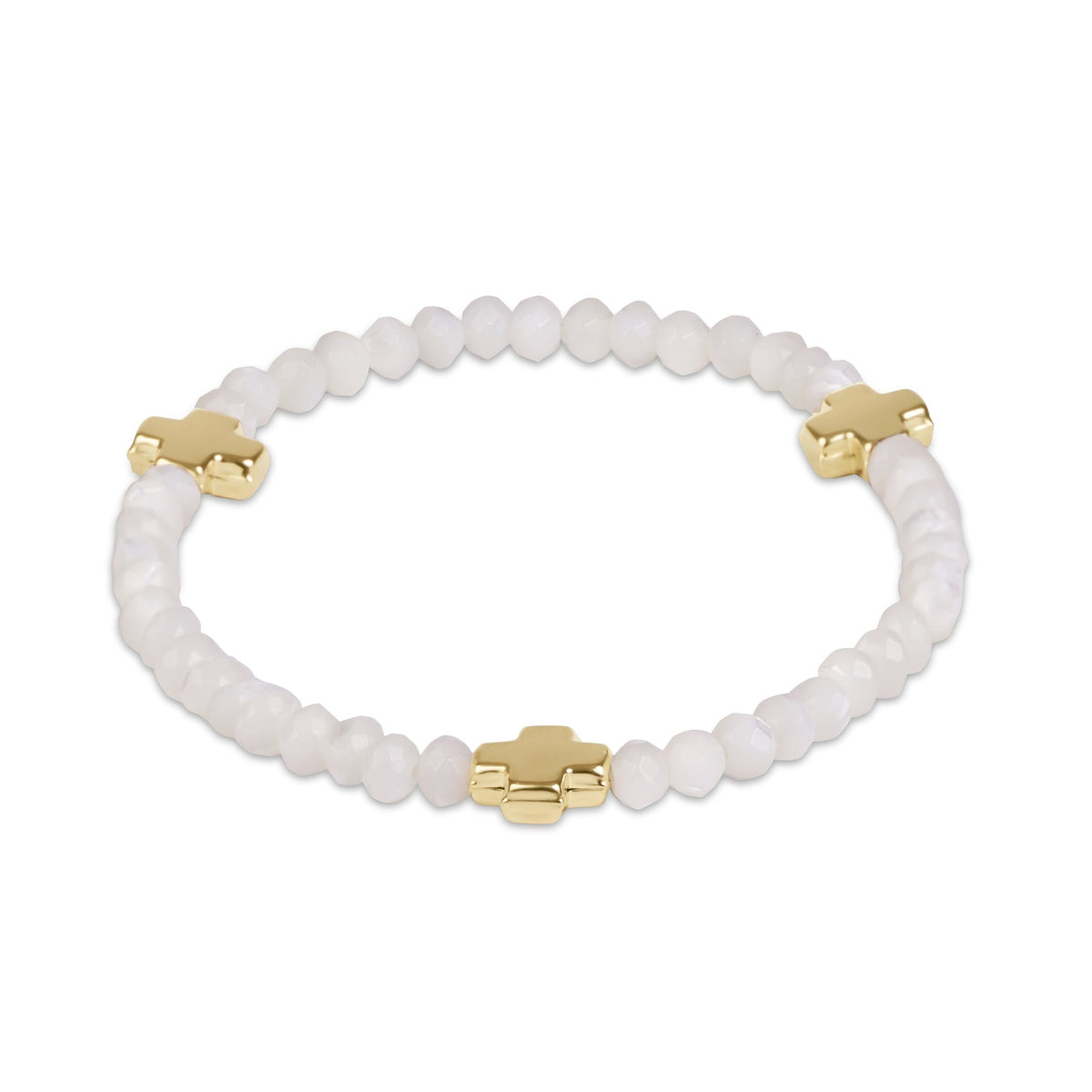 A beaded stretch bracelet featuring small, round white beads and three polished gold cross charms.