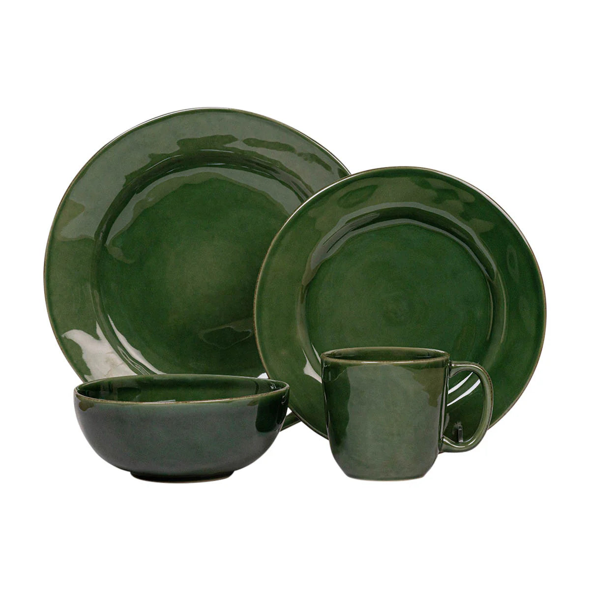 Green ceramic dinnerware set on a white background