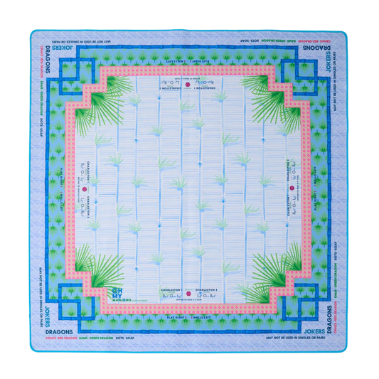 Board game mahjong mat with grid design and decorative borders on a white background