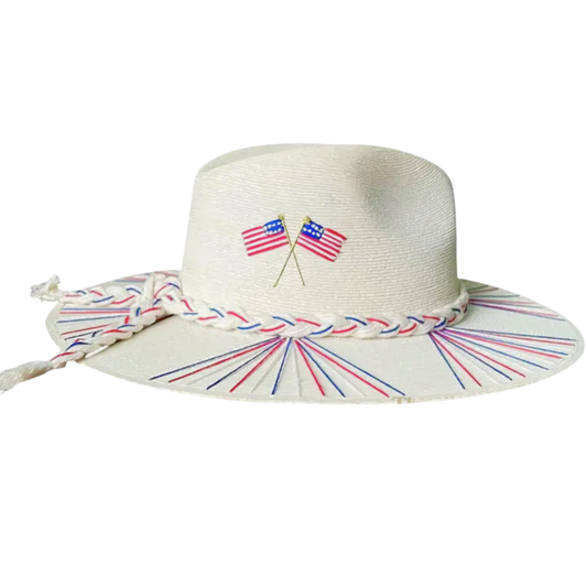 White straw hat with American flags and braided band on a white background