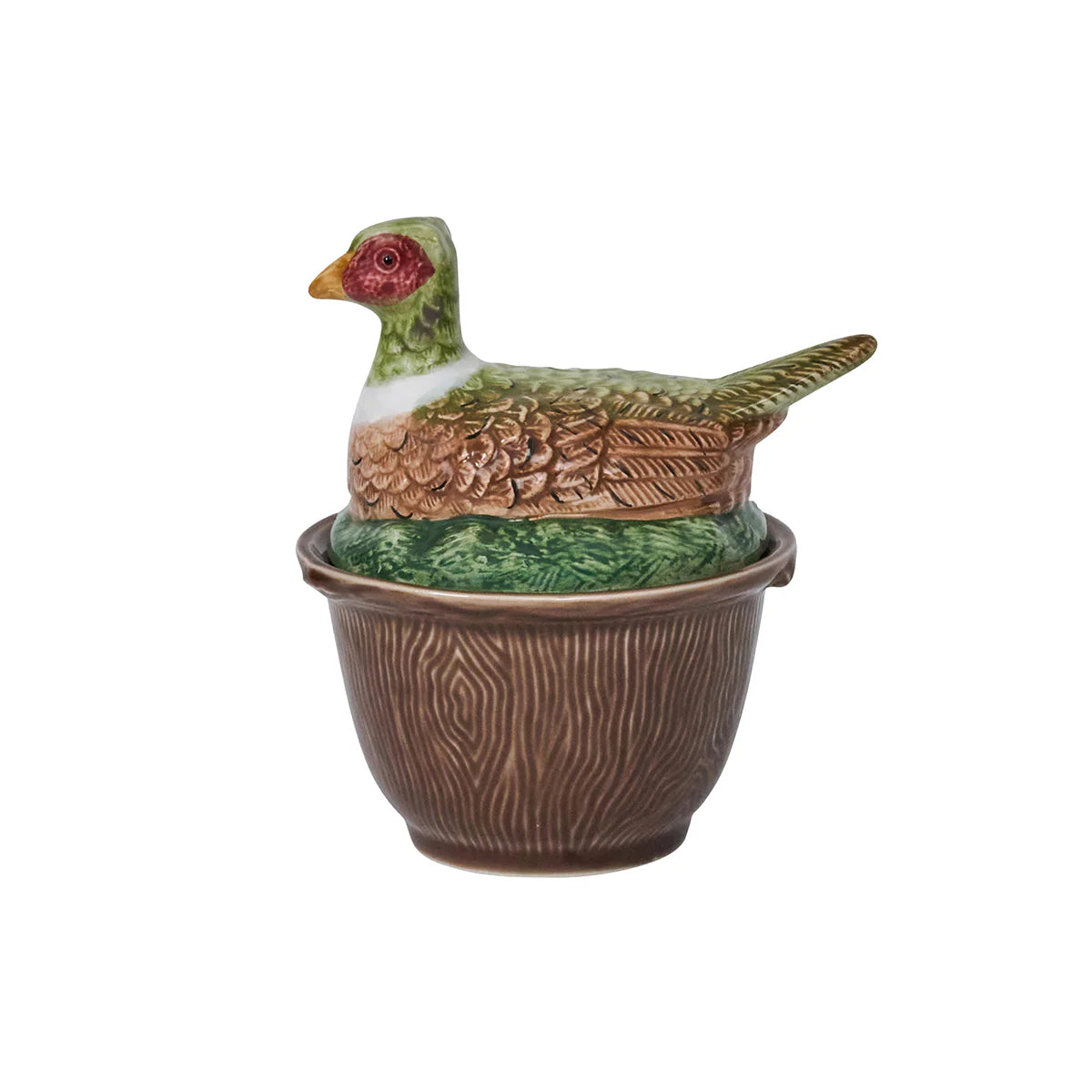 A brown-ceramic, faux bois bowl with a lid with a pheasant laying in grass.
