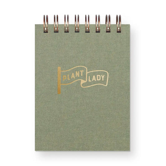 Green notebook with 'Plant Lady' design on a white background