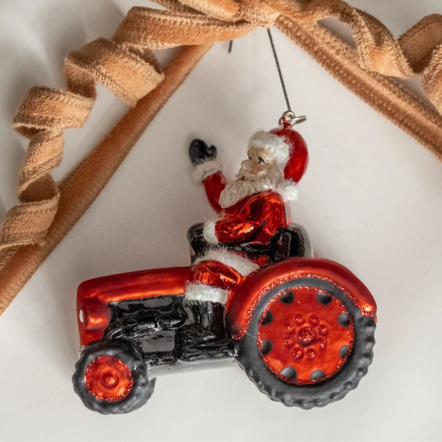 Santa on a Tractor Ornament