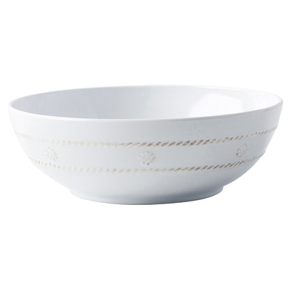 A white round melamine bowl with a pattern of berries and threads around the exterior.